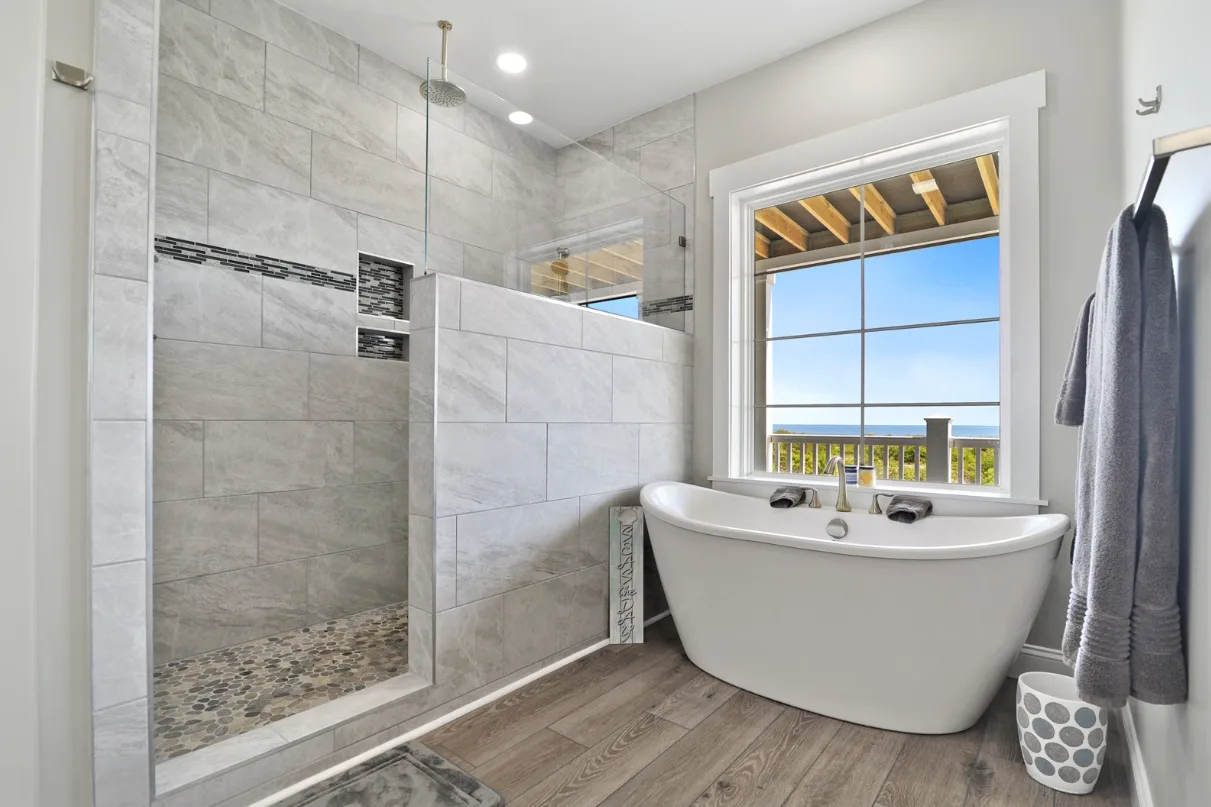 Freestanding tub and glass shower in Blue Hen Construction bathroom remodel